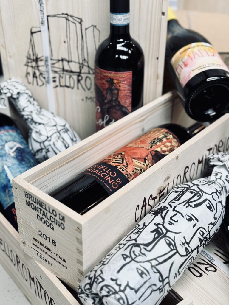 Wine Bottles in different sizes with art on them